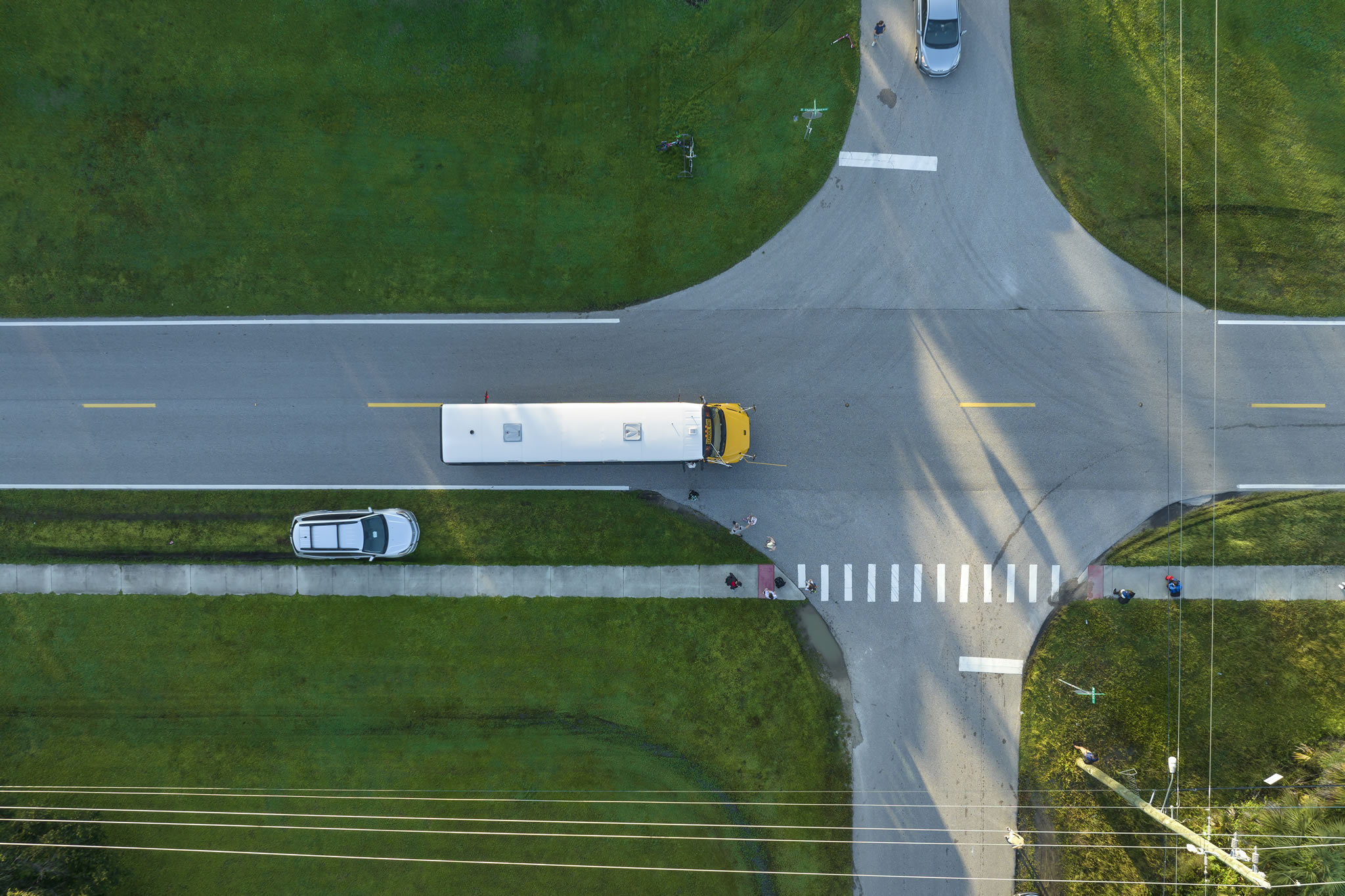 aerial-view-of-american-yellow-school-bus-picking-reduced